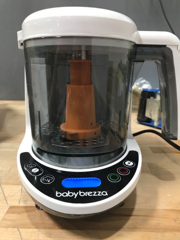 Photo 3 of ***POWERS ON*** Baby Brezza One Step Baby Food Maker Deluxe – Cooker and Blender in One to Steam and Puree Baby Food for Pouches - Make Organic Food for Infants and Toddlers - Set Includes 3 Pouches and 3 Funnels