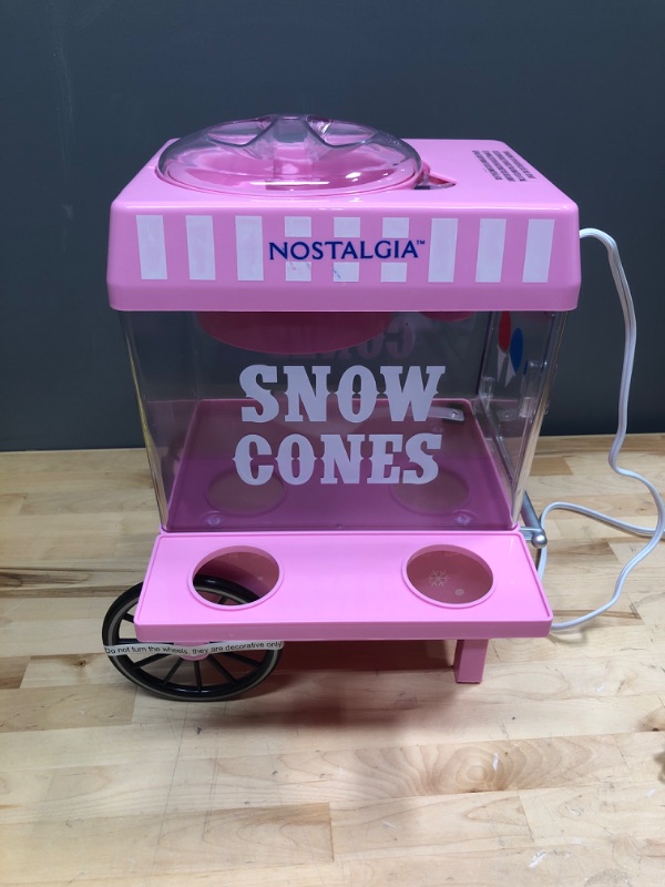 Photo 2 of ****PARTS ONLY*** Nostalgia Vintage Countertop Snow Cone Machine - Slushie Machine - Shaved Ice Machine and Crushed Ice Maker - Makes 20 Icy Treats, Includes 2 Reusable Plastic Cups & Ice Scoop – Pink
