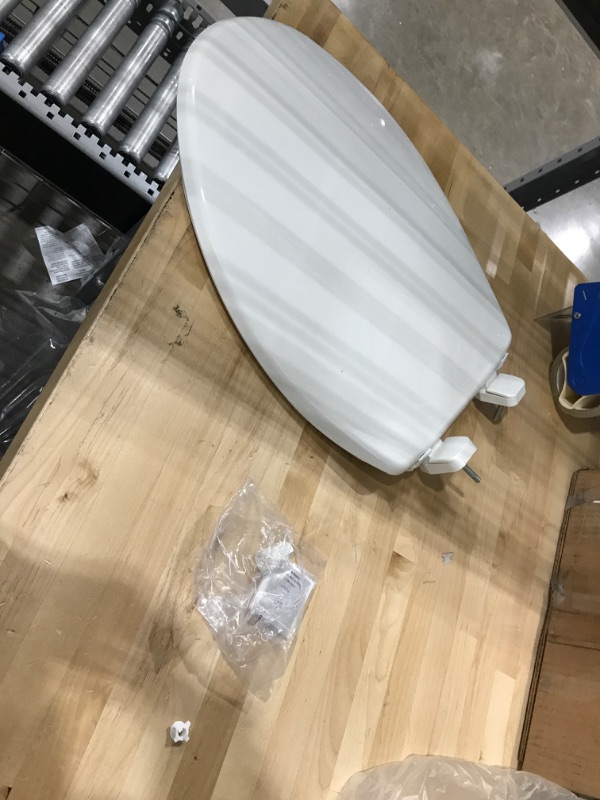 Photo 6 of **USED**
Little2Big 181SLOW 000 Toilet Seat with Built-In Potty Training Seat, Slow-Close, and will Never Loosen, ELONGATED, White 1 Pack Elongated