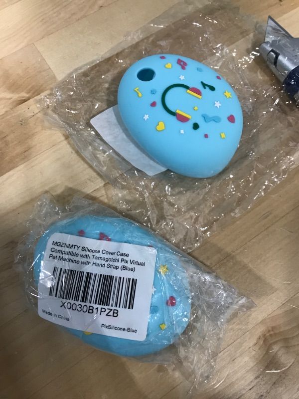 Photo 1 of MGZNMTY Silicone Cover Case Compatible with Tamagotchi Pix Virtual Pet Machine with Hand Strap (Blue) 2packs