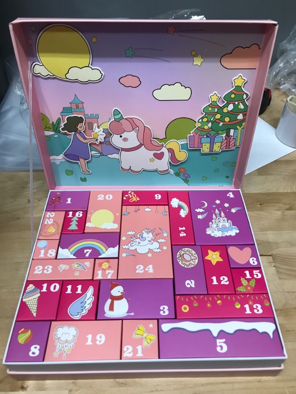 Photo 2 of Advent Calendar 2022 for Girls 24-Days Christmas Countdown Calendar Gifts,Xmas Gift Box Calendar for Kids Toddlers,Including Hair Clips, Stickers, Unicorn