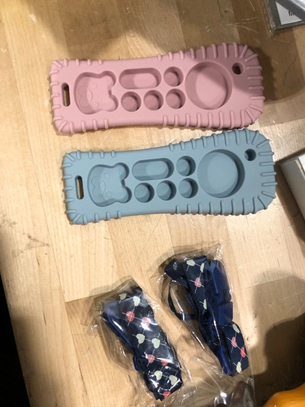 Photo 1 of Baby Teething Toys, 2Pack Silicone Teething Toys for Babies 3-6Months, Baby Chew Toys 6 to 12 Months, Newborn Baby Teether, TV Remote Control Teething Toys for Boy Girl (Pink+Blue)