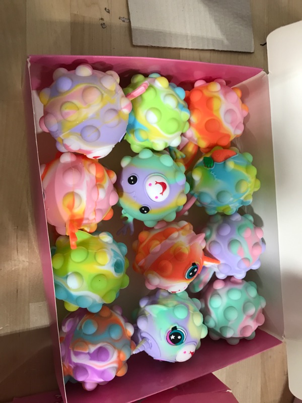 Photo 2 of Easter Baskets for Kids Toys Squishy Animal Pop Stress Balls,Easter Basket Stuffers Goodie Bag, Pop Unicorn Fidget Toys Fidget 2 Packs