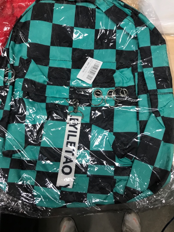 Photo 1 of BACKPACK CHECKERED TURQUOISE AND BLACK 