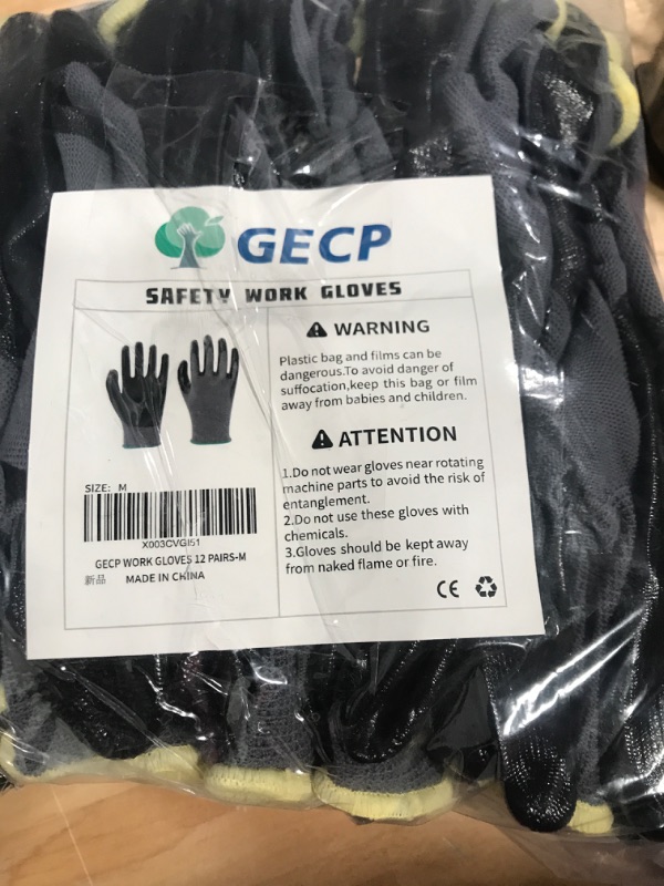 Photo 1 of 12 pair medium saftey gloves