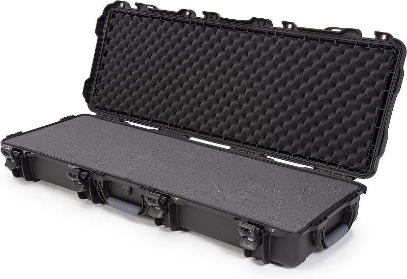 Photo 1 of Nanuk 990 Waterproof Professional Gun Hard Case with Foam Insert for Rifle w/ Wheels - Black
Color:Black
Style:Rifle Foam