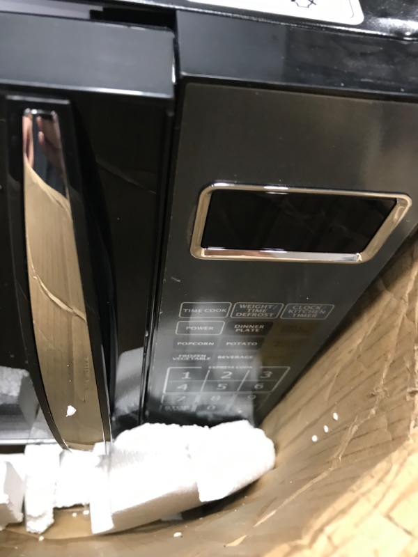 Photo 4 of *DAMAGED**
item is used- door will not shut
Emerson 1.2 CU. FT. 1100W Griller Microwave Oven with Touch Control, Stainless Steel, MWG9115SB 1.2 Black & Stainless Steel