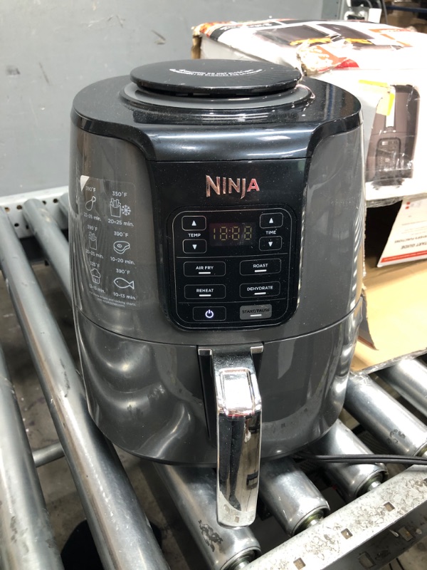 Photo 2 of **USED**
Ninja AF101 Air Fryer that Crisps, Roasts, Reheats, & Dehydrates, for Quick, Easy Meals, 4 Quart Capacity, & High Gloss Finish, Black/Grey 4 Quarts