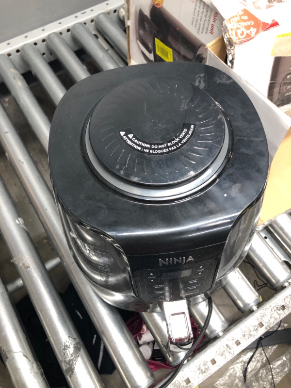 Photo 5 of **USED**
Ninja AF101 Air Fryer that Crisps, Roasts, Reheats, & Dehydrates, for Quick, Easy Meals, 4 Quart Capacity, & High Gloss Finish, Black/Grey 4 Quarts