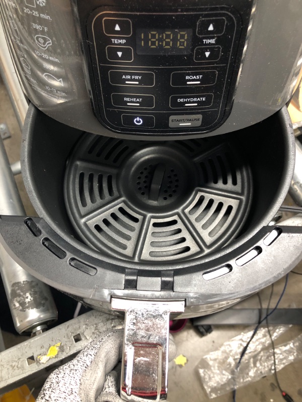 Photo 3 of **USED**
Ninja AF101 Air Fryer that Crisps, Roasts, Reheats, & Dehydrates, for Quick, Easy Meals, 4 Quart Capacity, & High Gloss Finish, Black/Grey 4 Quarts