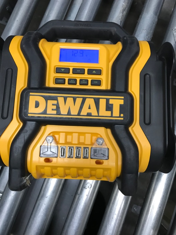 Photo 1 of DEWALT DXAEPS14 1600 Peak Battery Amp 12V Automotive Jump Starter/Power Station with 500 Watt AC Power Inverter, 120 PSI Digital Compressor, and USB Power , Yellow