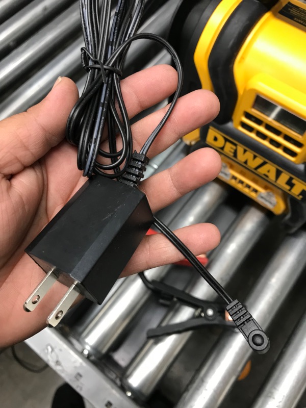Photo 1 of DEWALT DXAEPS14 1600 Peak Battery Amp 12V Automotive Jump Starter/Power Station with 500 Watt AC Power Inverter, 120 PSI Digital Compressor, and USB Power , Yellow