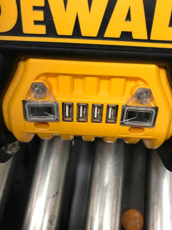 Photo 1 of DEWALT DXAEPS14 1600 Peak Battery Amp 12V Automotive Jump Starter/Power Station with 500 Watt AC Power Inverter, 120 PSI Digital Compressor, and USB Power , Yellow