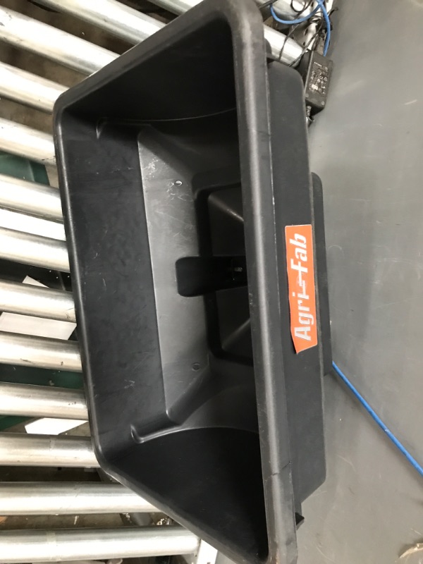 Photo 1 of Agri-Fab Inc 45-0530-131, 85 lb. Tow Broadcast Spreader, Black/Orange
