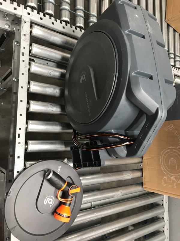 Photo 1 of Giraffe Tools Retractable Garden Hose Reel 1/2 Inch x 130 ft, Super Heavy Duty, Any Length Lock, Slow Return System, Wall Mounted and 180 Deg Swivel Bracket