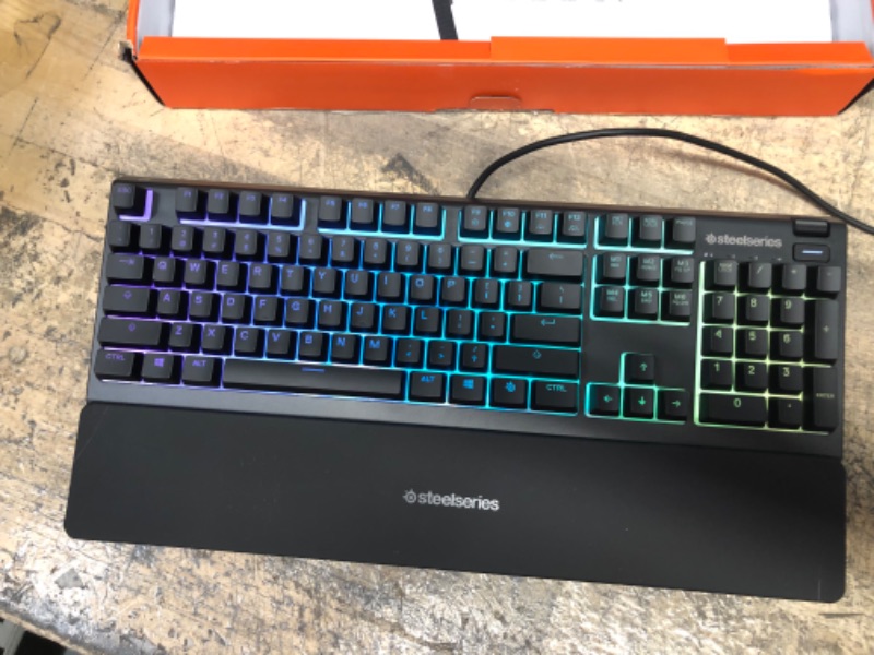 Photo 4 of SteelSeries Apex 3 RGB Gaming Keyboard – 10-Zone RGB Illumination – IP32 Water Resistant – Premium Magnetic Wrist Rest (Whisper Quiet Gaming Switch)