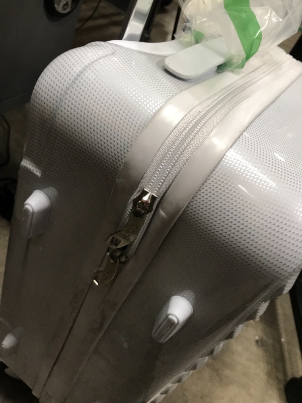 Photo 4 of **PULL HANDLE DOES NOT COLLAPSE**
20" white hard shell coolife suitcase