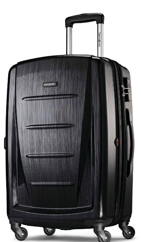 Photo 1 of **ALL PARTS FUNCTIONAL**
SAMSONITE 24" MEDIUM SPINNER
