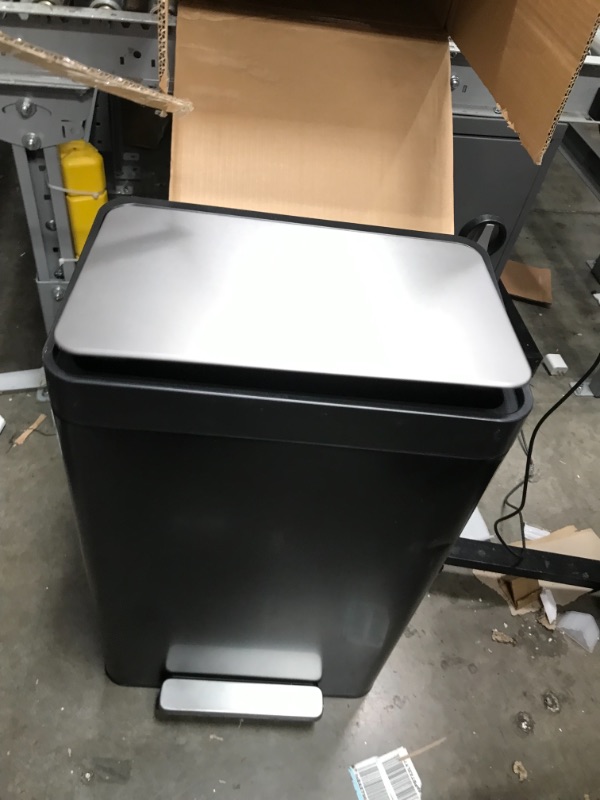 Photo 3 of ***MINOR DENTS***
Kohler 20940-BST Step Trash Can, 13 Gallon, Black with Stainless Steel Black Stainless Steel 13 Gallon Can