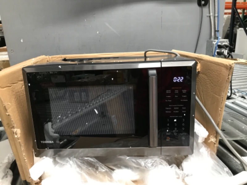 Photo 5 of **HAS DENTS BUT FUNCTIONS**
TOSHIBA ML2-EM12EA(BS) Countertop Microwave Oven With Stylish Design As Kitchen Essentials, Smart Sensor, ECO Mode & Mute Function, 1.2 Cu Ft With 12.4" Turntable, 1100W, Black Stainless Steel 1.2 Cu. Ft.-Smart Sensor