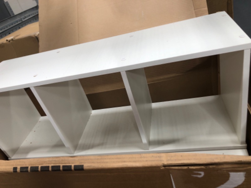 Photo 2 of  a pair of white shelves 