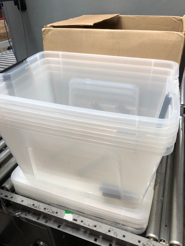 Photo 4 of *** USED *** IRIS USA 53 Qt. Plastic Storage Container Bin with Secure Lid and Latching Buckles, 4 pack - Clear, Durable Stackable Nestable Organizing Tote Tub Box Sports General Organization Garage Large