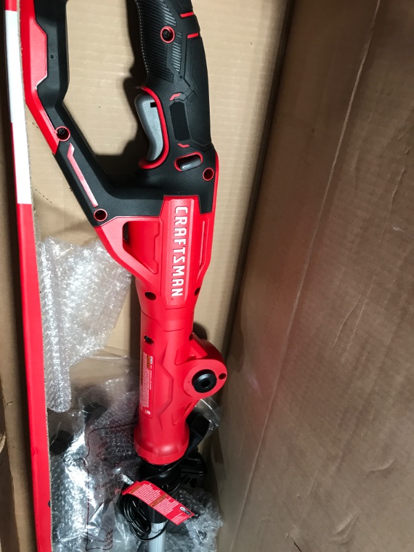 Photo 2 of CRAFTSMAN CMCST900D1 V20* Cordless WEEDWACKER® String Trimmer/Edger - Automatic Line Advance Feed with CMCHTS820D1 V20* 22" Cordless Hedge Trimmer w/ Hedge Trimmer
