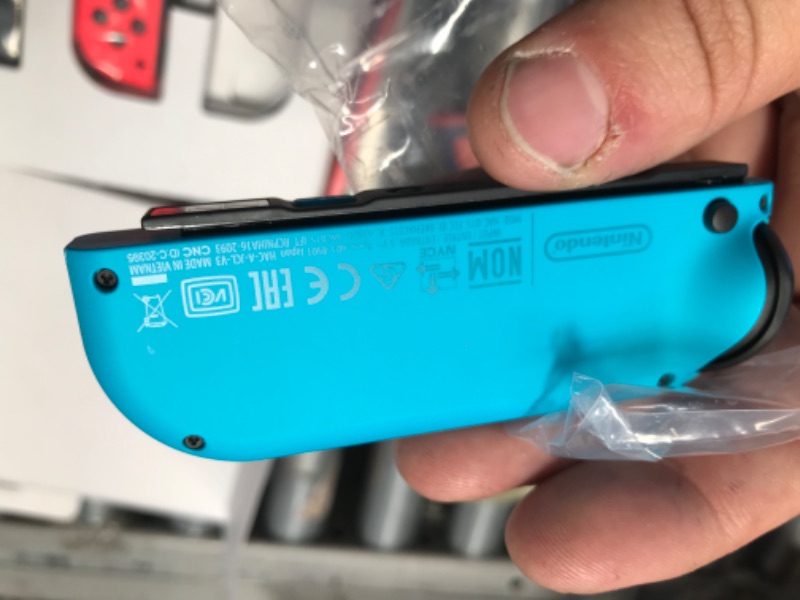 Photo 6 of Nintendo Switch (Neon Red/Neon blue)
