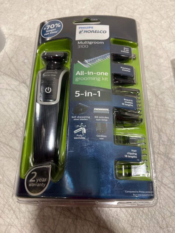 Photo 2 of Philips Norelco Multigroom 3100 with 5 attachments and skin-friendly blades, QG3330/49 - sealed - 

