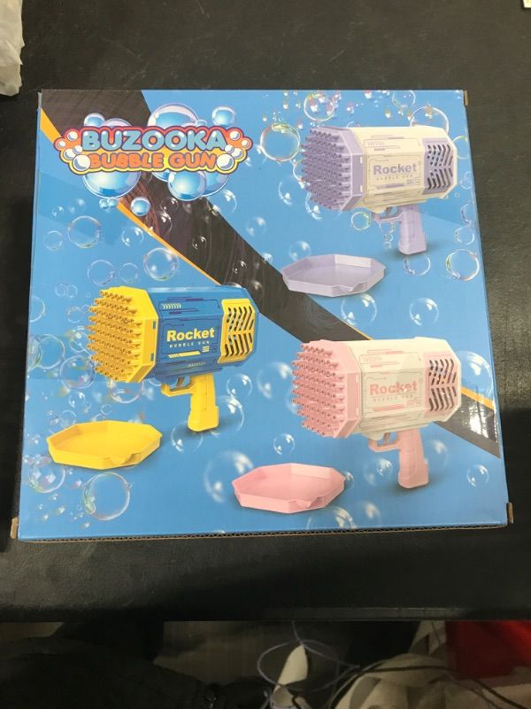 Photo 2 of Bubble Gun Toys 69 Holes with Colorful Lights, Big Rocket Launcher Bzaooka Bubble Blower, Party Bubble Maker Machine Gun Toys for Kids All Ages and Adults, Gifts for Boys and Girls 69-pink