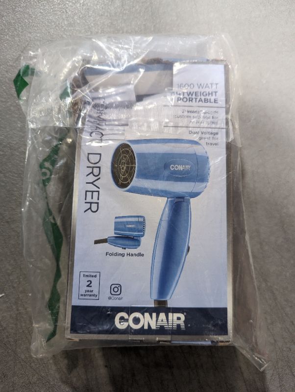 Photo 1 of Conair Travel Hair Dryer with Dual Voltage, 1600W Compact Hair Dryer with Folding Handle, Travel Blow Dryer 1600 Watt