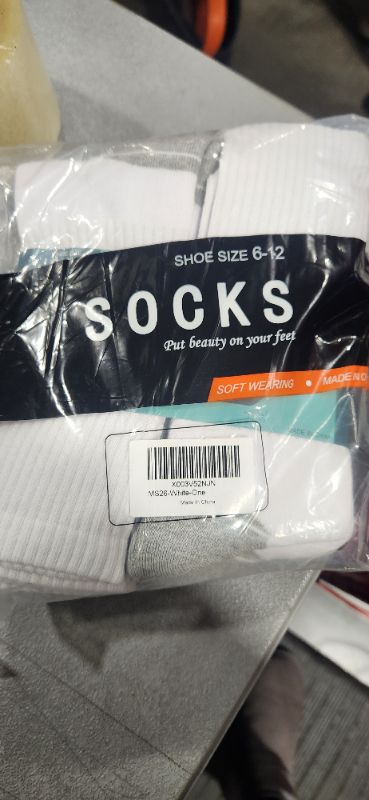 Photo 1 of 6 pack of socks- shoe size 6-12