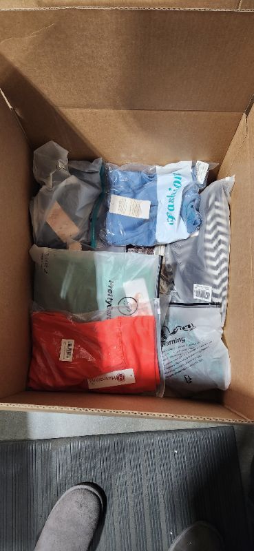 Photo 2 of Box lot of misc mens, womens, and kids clothing. 28 pieces. New and used. Sold as is.