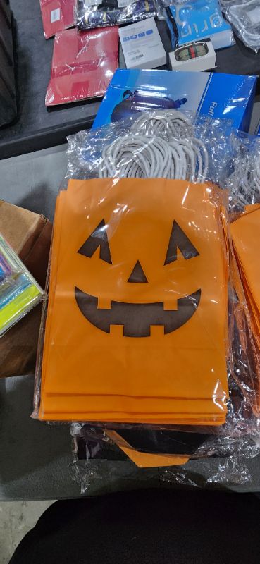 Photo 2 of 16 Pieces Halloween Pumpkin Gift Candy Bags Halloween Paper Bags with Handle Trick or Treat Bags Party Favor for Halloween Party Decorations