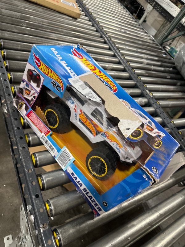 Photo 2 of ?Hot Wheels Remote Control Truck, White Ford RC Vehicle with Full-Function Remote Control, Large Wheels & High-Performance Engine, 2.4 GHz with Range of 65 Feet HW TEAM HW JUMP TRUCK RC