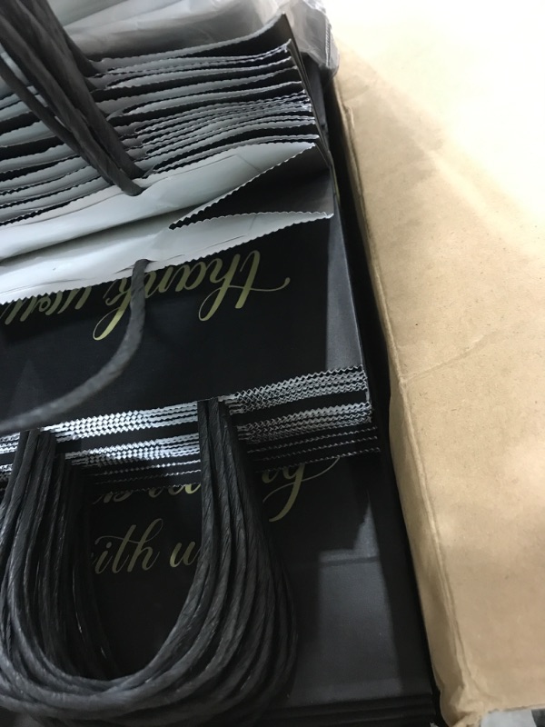 Photo 1 of 50 Pack Medium Sized Black Thank You Gift Bags with Tissue Paper 10x8x4 Inch, Thank You for Celebrating with Us Bags with Handles for Wedding Hotel Guests, Bridal Shower Birthday Party Favors