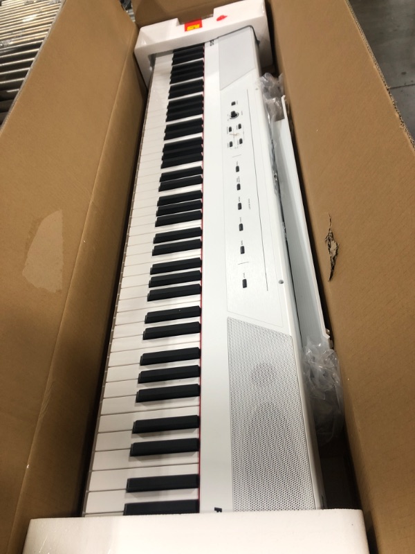 Photo 2 of Alesis Recital – 88 Key Digital Piano Keyboard with Semi Weighted Keys, 2x20W Speakers, 5 Voices, Split, Layer and Lesson Mode, FX and Piano Lessons
