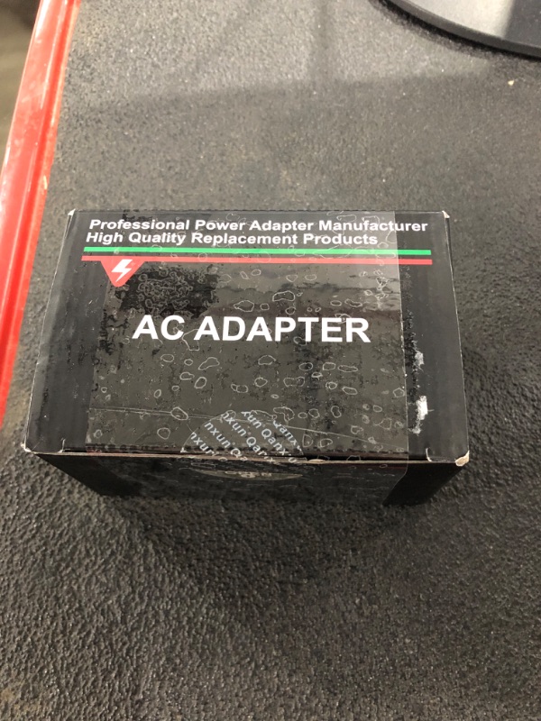 Photo 1 of Ac Adapter with multi-bit plug ins.