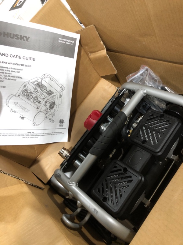 Photo 1 of Husky 1 Gal. Portable Electric-Powered Silent Air Compressor