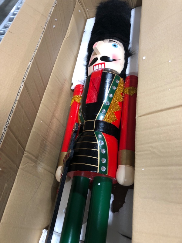 Photo 3 of Liliful 4ft Large Christmas Nutcracker Outdoor Decoration Wooden Xmas Large Nutcracker Soldier Christmas Holiday Soldier Ornament on Stand Nutcracker Decorations for Xmas Holiday Garden Lawn Pathway