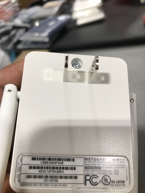 Photo 1 of NETGEAR Wi-Fi Range Extender EX6120 - Coverage Up to 1500 Sq Ft and 25 Devices with AC1200 Dual Band Wireless Signal Booster & Repeater (Up to 1200Mbps Speed), and Compact Wall Plug Design WiFi Extender AC1200