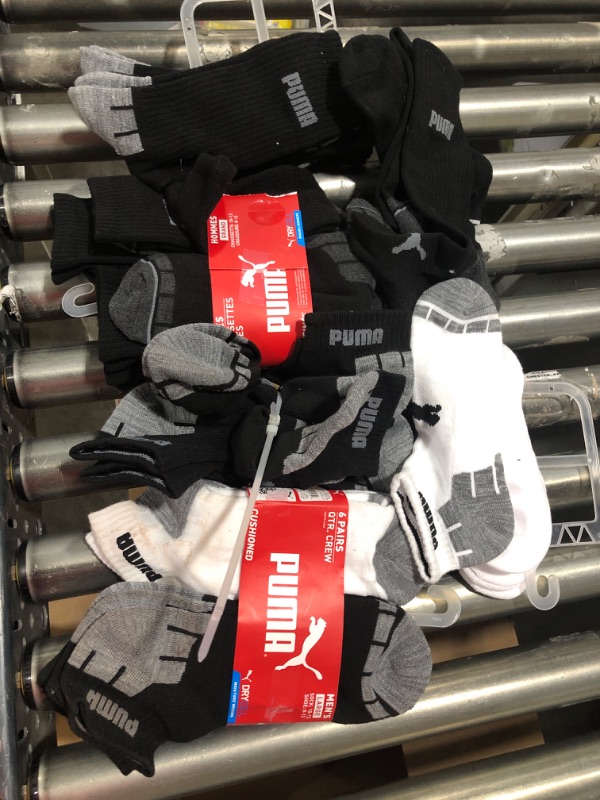 Photo 2 of bag of 20 pairs of puma socks 