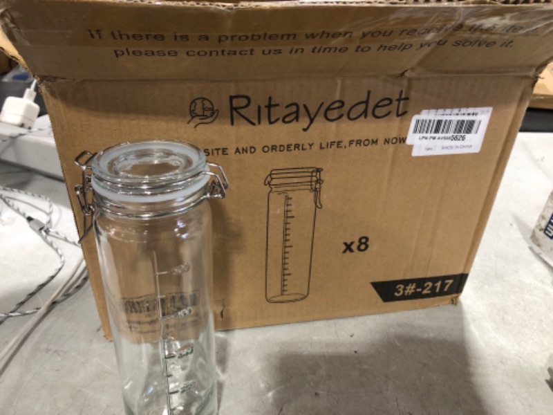 Photo 2 of Ritayedet Airtight Glass Jars Set of 8 with Hinged Lids for Vanilla Extract, Portable Glass Water Bottles with Leak Proof Silicone Seal, 20 oz(600ml), Dishwasher Safe