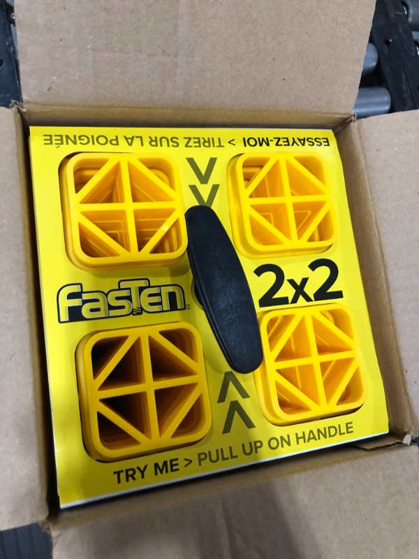 Photo 2 of Camco Fasten 2x2 Leveling Block for Single Tires-Interlocking Design Allows Stacking to Desired Height-Includes Secure T-Handle Carrying System-Yellow-10 Pack (21022) Yellow Single Tire Ships In Own Container