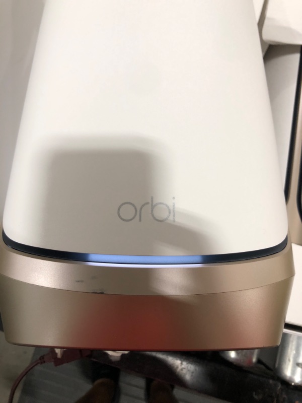 Photo 4 of NETGEAR Orbi Quad-Band WiFi 6E Mesh System (RBKE963), Router with 2 Satellite Extenders, Coverage up to 9,000 sq. ft, 200 Devices, 10 Gig Internet Port, AXE11000 802.11 Axe (Up to 10.8Gbps) WiFi 6E | 3-Pack