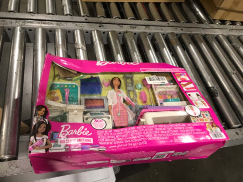 Photo 2 of Barbie Fast Cast Clinic Playset, Brunette Doctor Doll (12-in), 30+ Play Pieces, 4 Play Areas, Cast & Bandage Making, Medical & X-ray Stations, Exam Table, Gift Shop & More, Great Toy Gift