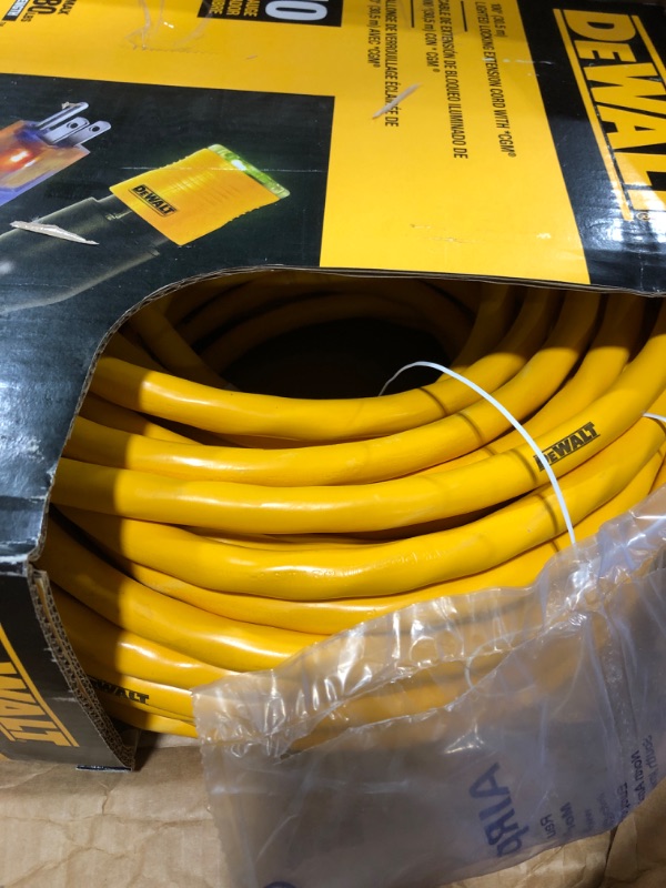 Photo 3 of DEWALT 100 Foot Extension CordLighted Click-to-Lock 10/3 SJTW -Heavy Duty Outdoor, Waterproof, Weatherproof, Heat & Corrosion Resistant Industrial Strength Light Up Three Prong Outlet Plug Power Cord 100 ft