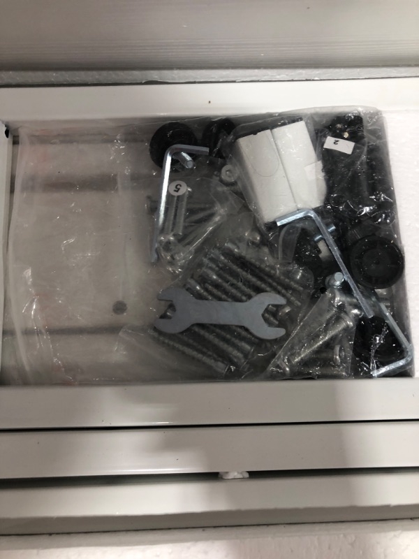 Photo 5 of ODK 40 Inch Small L Shaped Gaming Computer Desk with Power Outlets, Reversible Storage Shelves & PC Stand for Home Office Workstation, Modern Simple Writing Study Table with Storage Bag, White White 40 inch