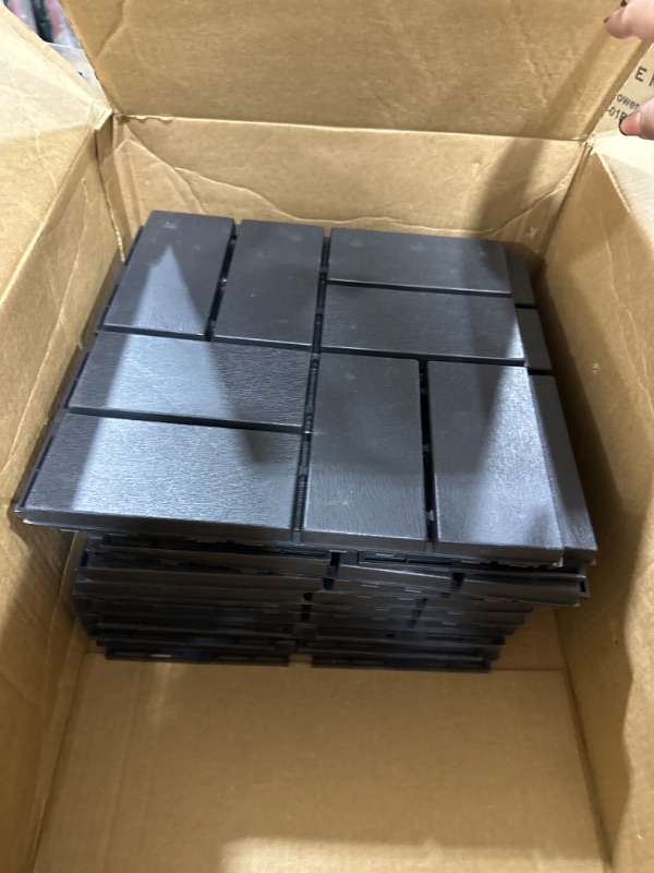 Photo 1 of Goovilla Plastic Interlocking Deck Tiles, 9 Pack Outdoor Patio Flooring, 12"x12" Interlocking Decking Tile Outdoor All Weather Use, Waterproof Patio Pavers for Pool Balcony Backyard Porch, Dark Grey 12"*12" Dark Grey 9