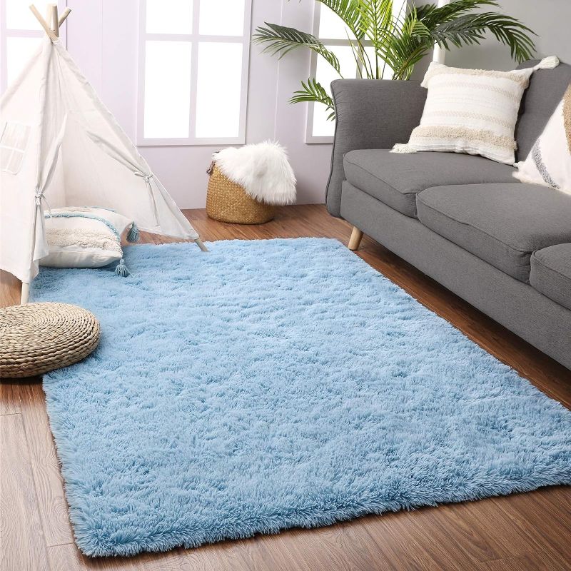 Photo 1 of  Soft Fluffy Area Rug Modern Shaggy Bedroom Rugs for Kids Room Extra Comfy Nursery Rug Floor Carpets Boys Girls Fuzzy Shag Fur Home Decor Rug, 4 ft x 5.3 ft, Cobalt Blue
